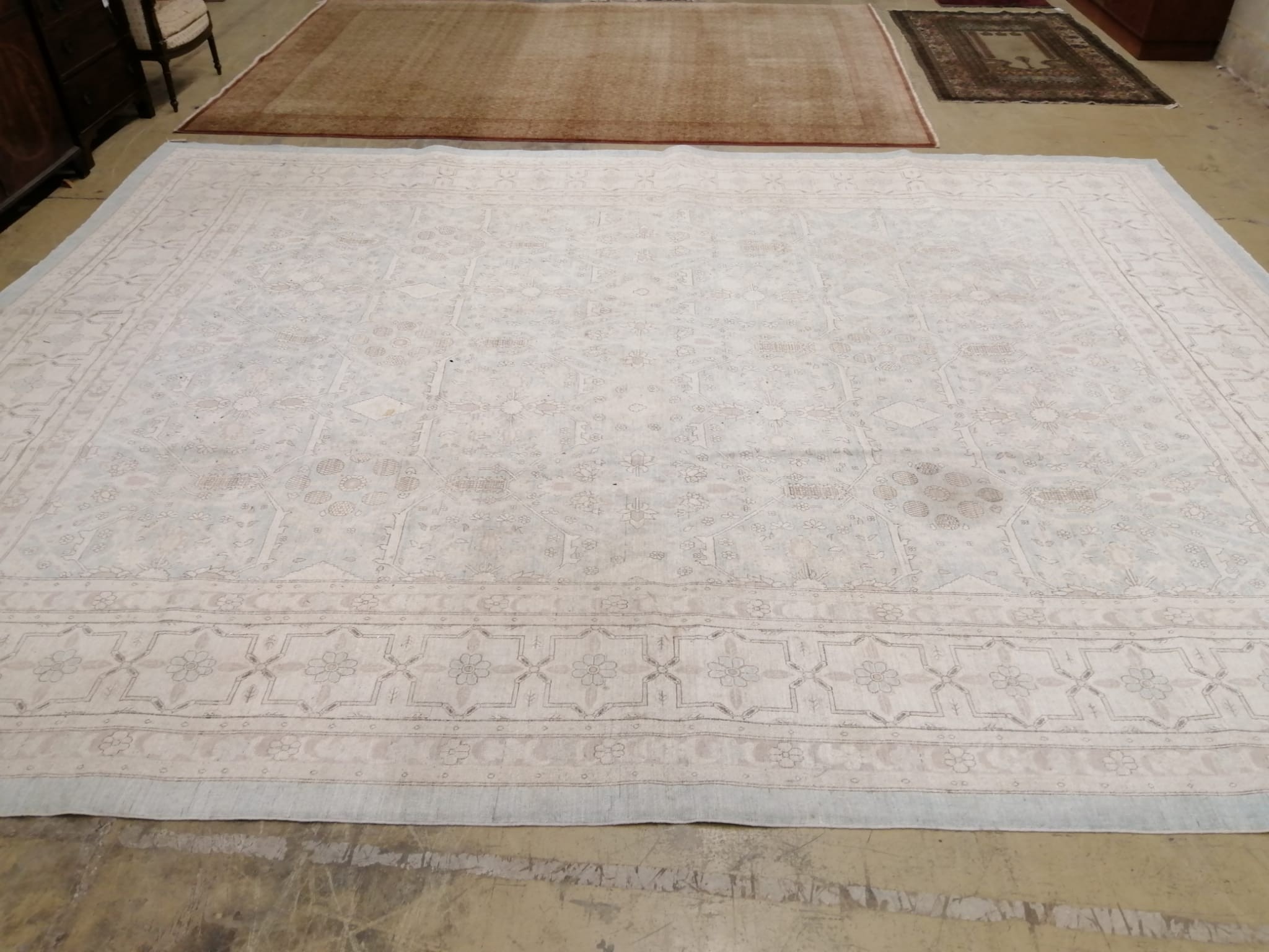 A modern North West Persian design aquamarine and ivory ground carpet, 480 x 370cm